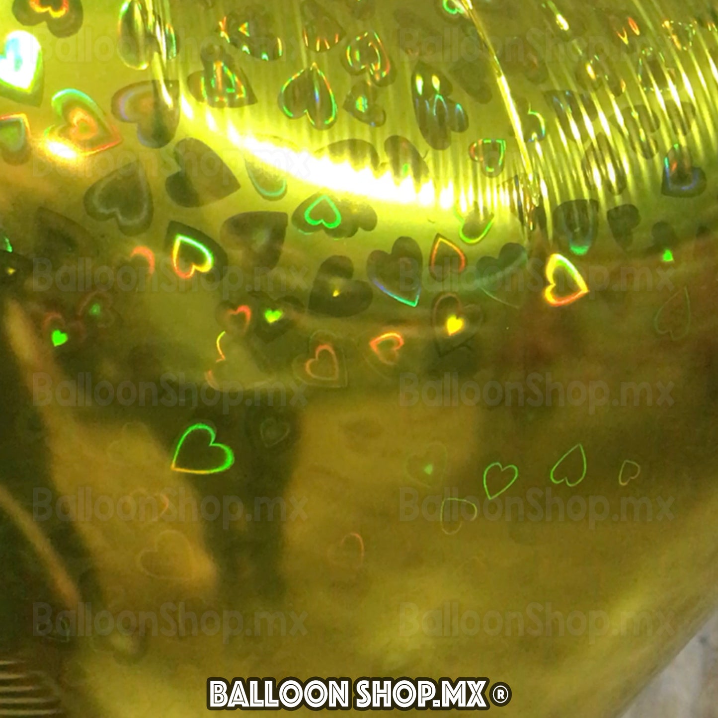 Corazón holográfico dorado